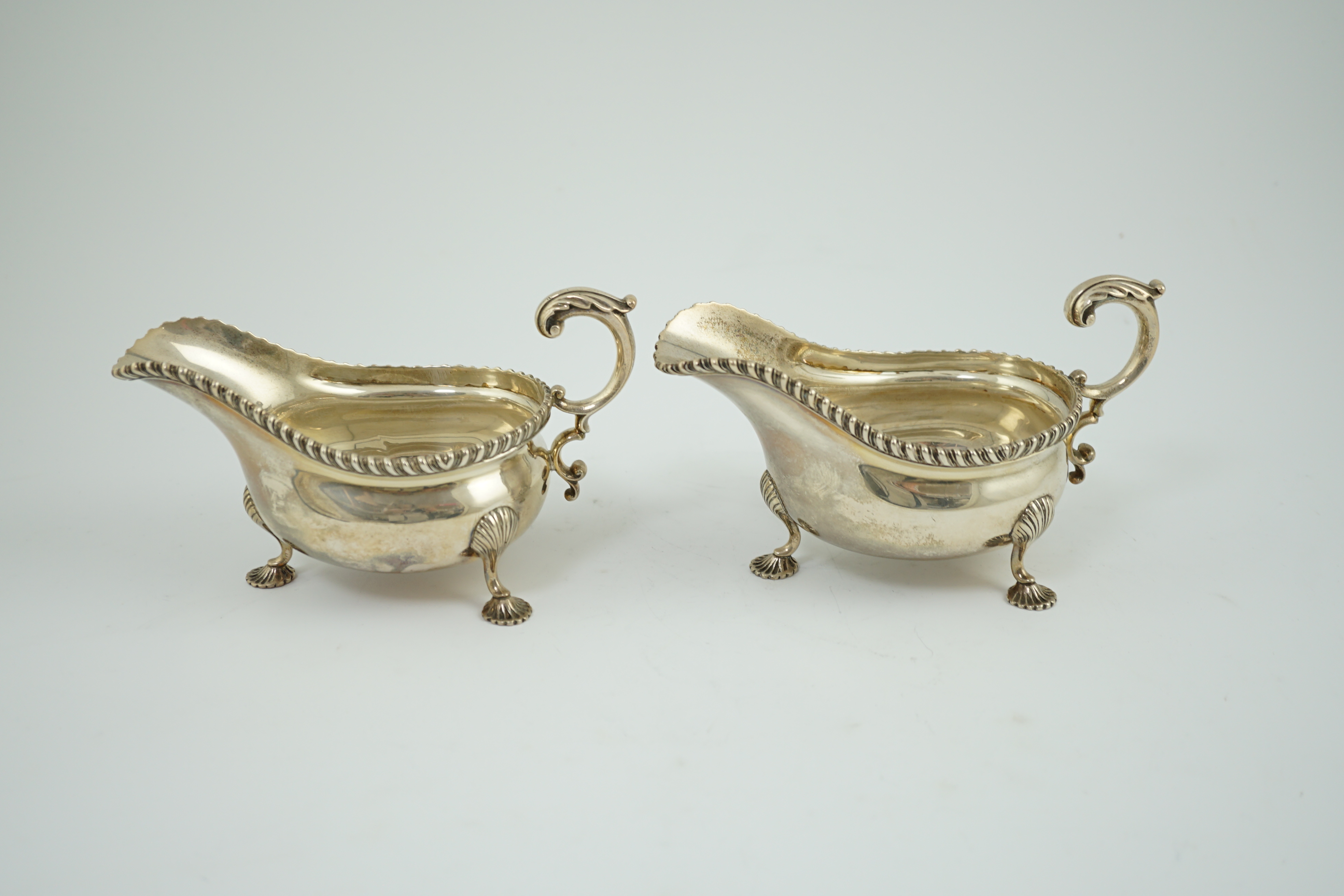 A pair of Edwardian silver sauce boats, by Goldsmiths & Silversmiths Co Ltd